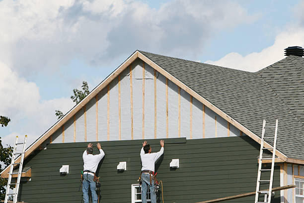 Professional Siding Replacement technician working in Creedmoor, NC